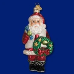 Old World Christmas Glass Ornament - Santa With A Wreath